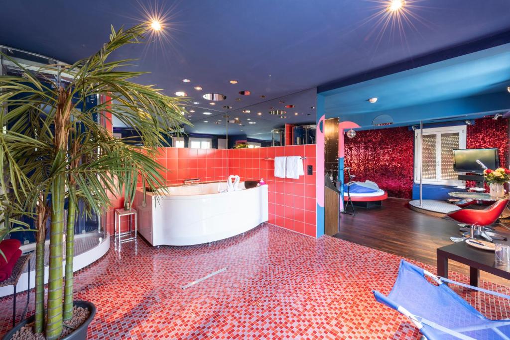 Posezení v ubytování Hotel Zeit & Traum Privat SPA