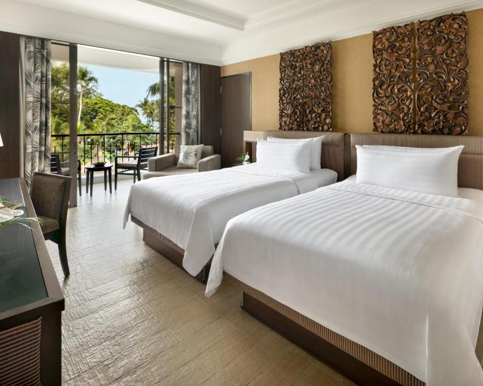 Voodi või voodid majutusasutuse Shangri-La Golden Sands, Penang toas