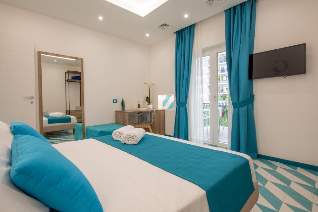 TV a/nebo společenská místnost v ubytování Gea Suite B&B