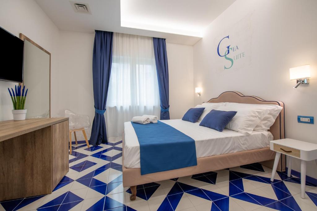 Postel nebo postele na pokoji v ubytování Gea Suite B&B