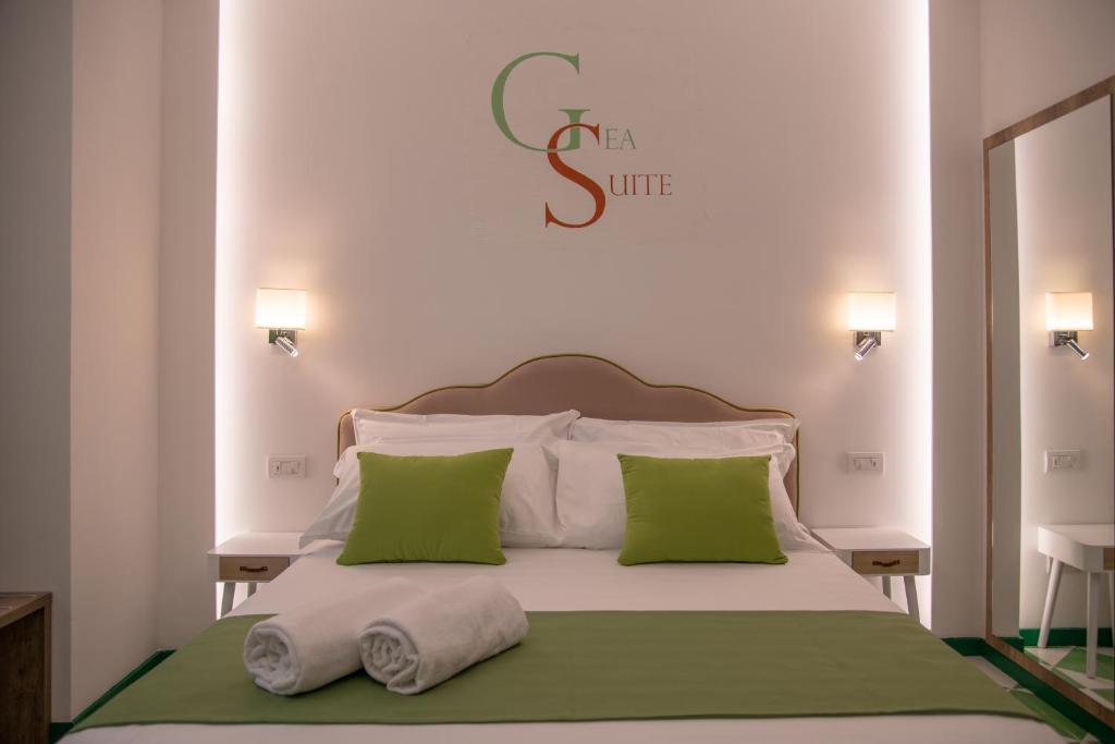 Postel nebo postele na pokoji v ubytování Gea Suite B&B