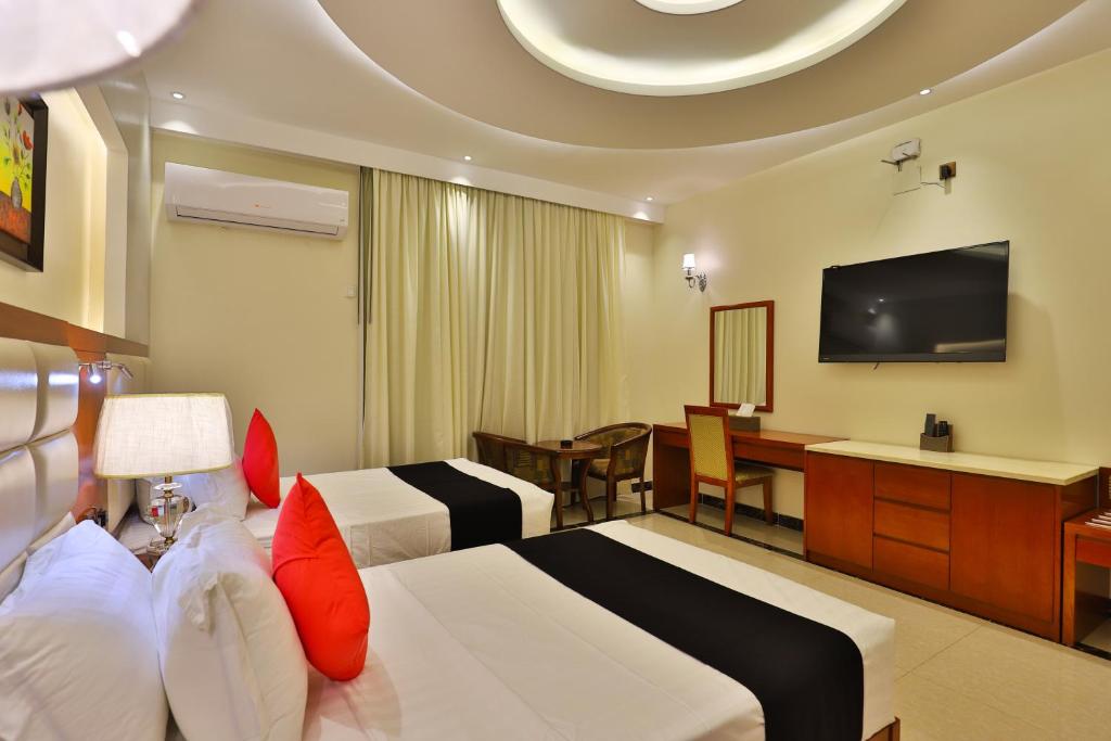 Postel nebo postele na pokoji v ubytování Dreams Houses furnished Suites