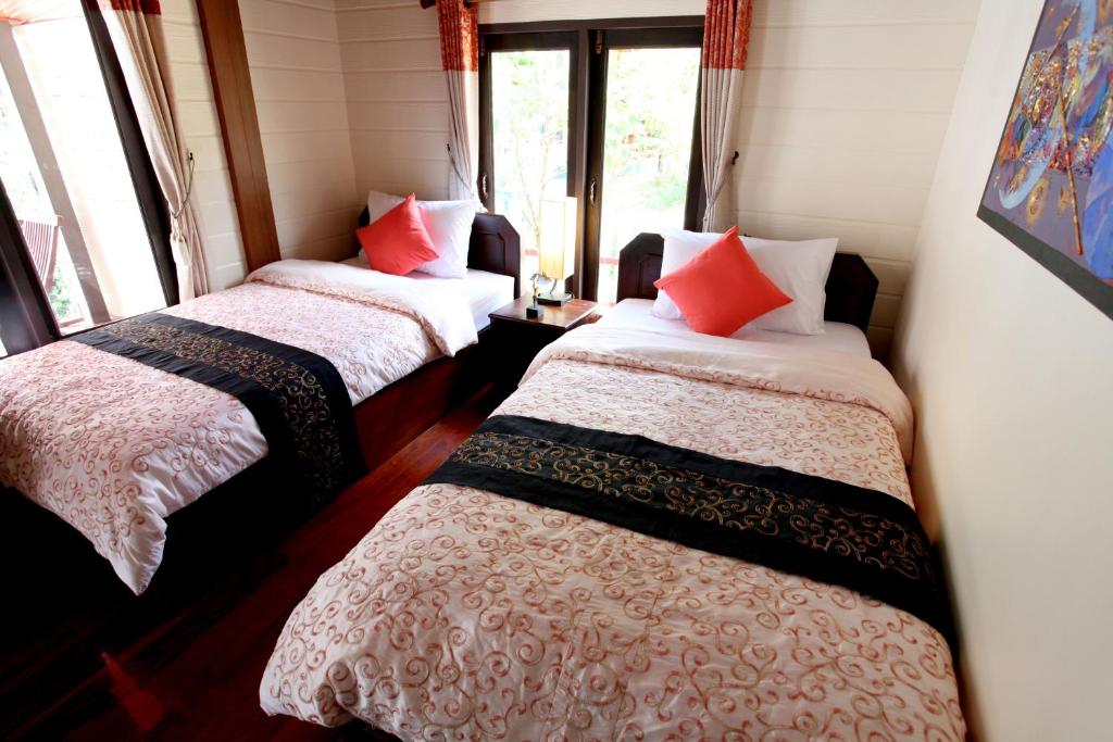 Postel nebo postele na pokoji v ubytování Ao Nang Home Stay - Adults Only