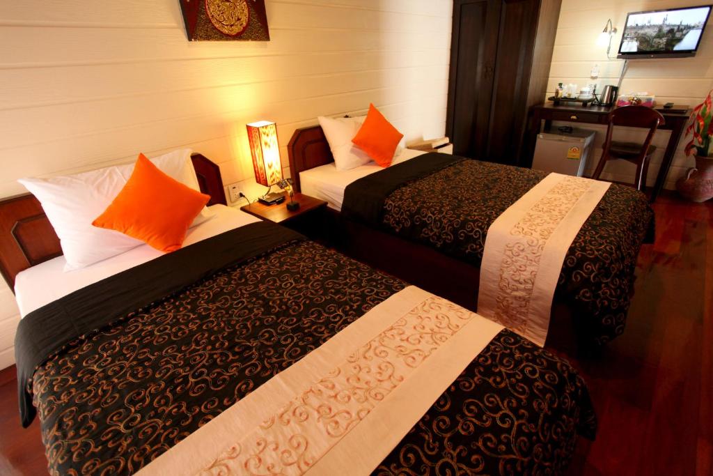 Postel nebo postele na pokoji v ubytování Ao Nang Home Stay - Adults Only