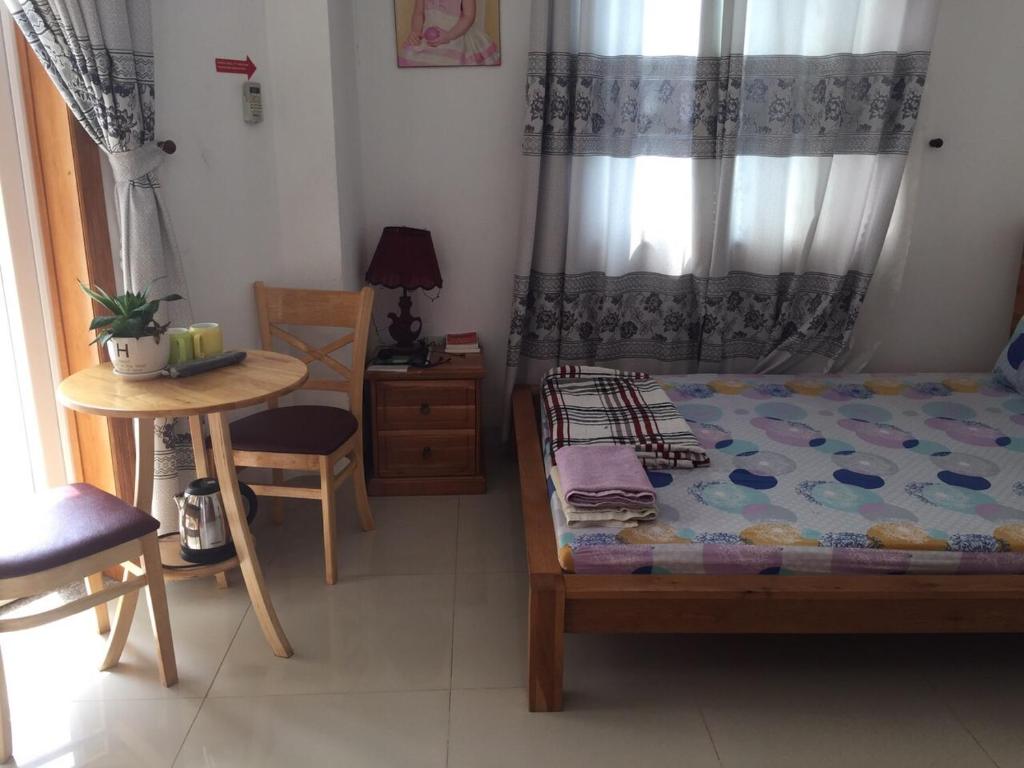 Letto o letti in una camera di Thom's Homestay