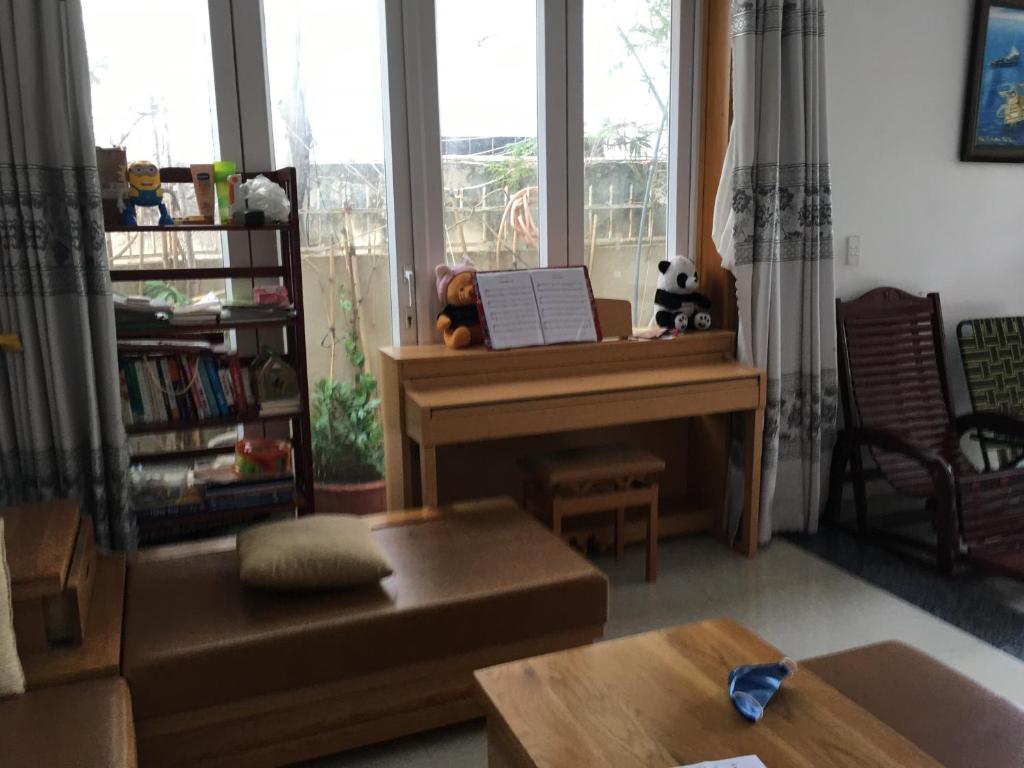 Area soggiorno di Thom's Homestay