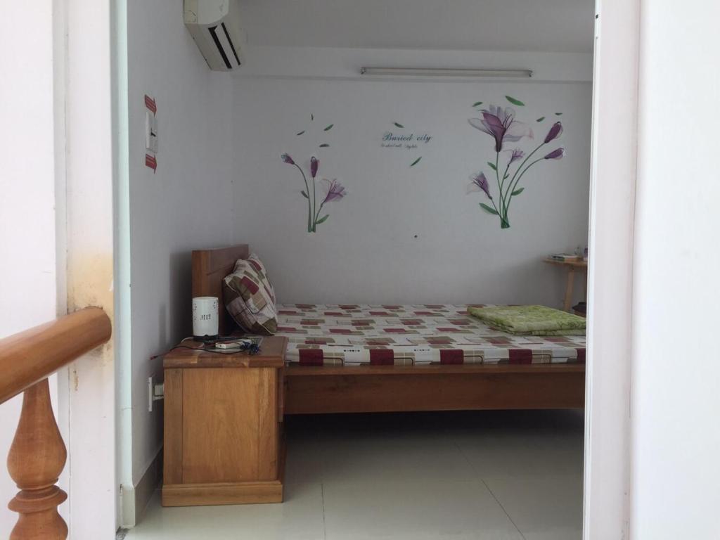 Letto o letti in una camera di Thom's Homestay