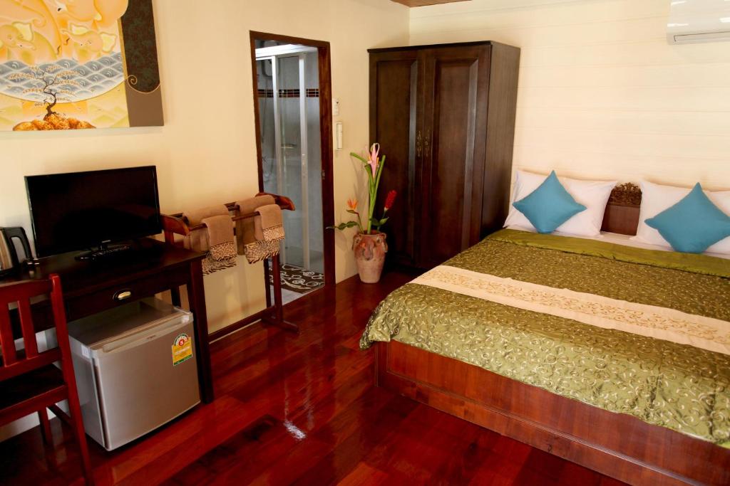 Postel nebo postele na pokoji v ubytování Ao Nang Home Stay - Adults Only