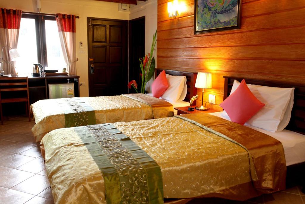 Postel nebo postele na pokoji v ubytování Ao Nang Home Stay - Adults Only