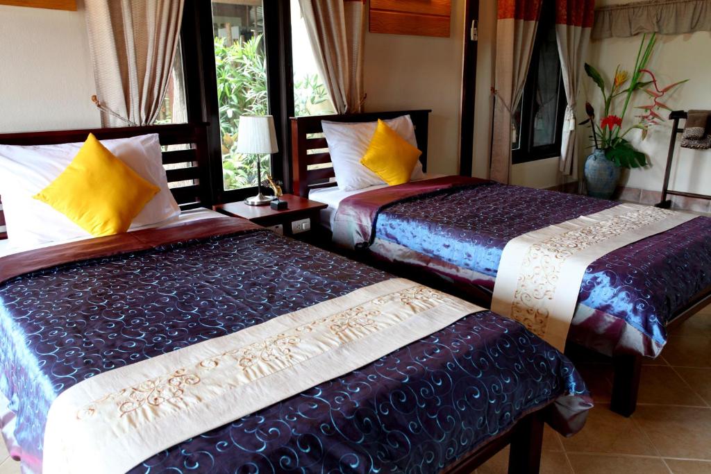 Postel nebo postele na pokoji v ubytování Ao Nang Home Stay - Adults Only