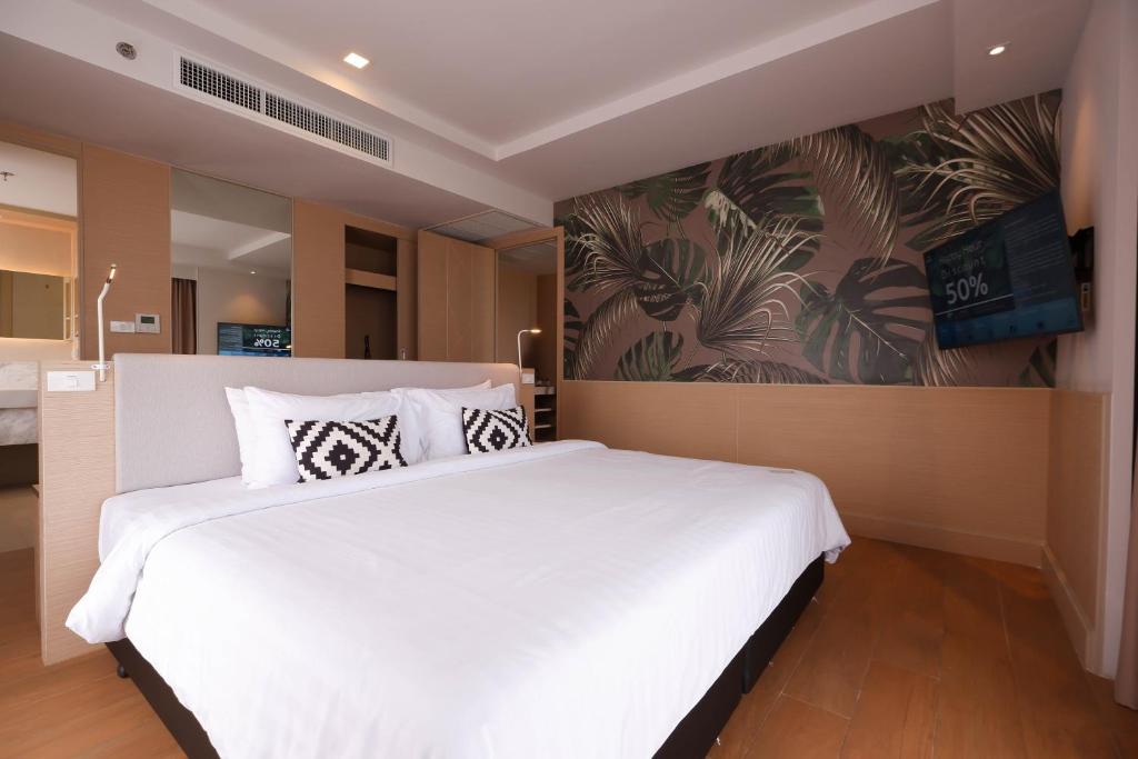 Postel nebo postele na pokoji v ubytování Panan Krabi Resort