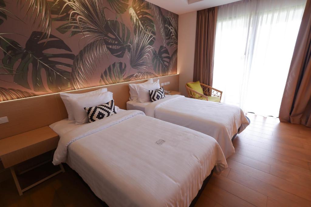 Postel nebo postele na pokoji v ubytování Panan Krabi Resort