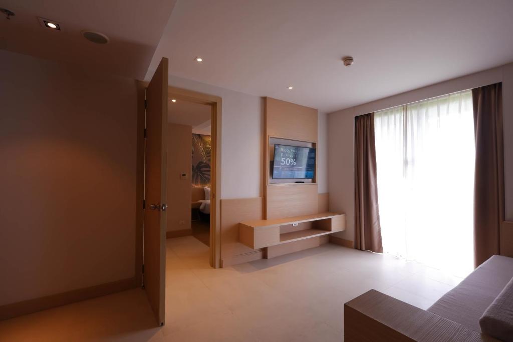 TV a/nebo společenská místnost v ubytování Panan Krabi Resort