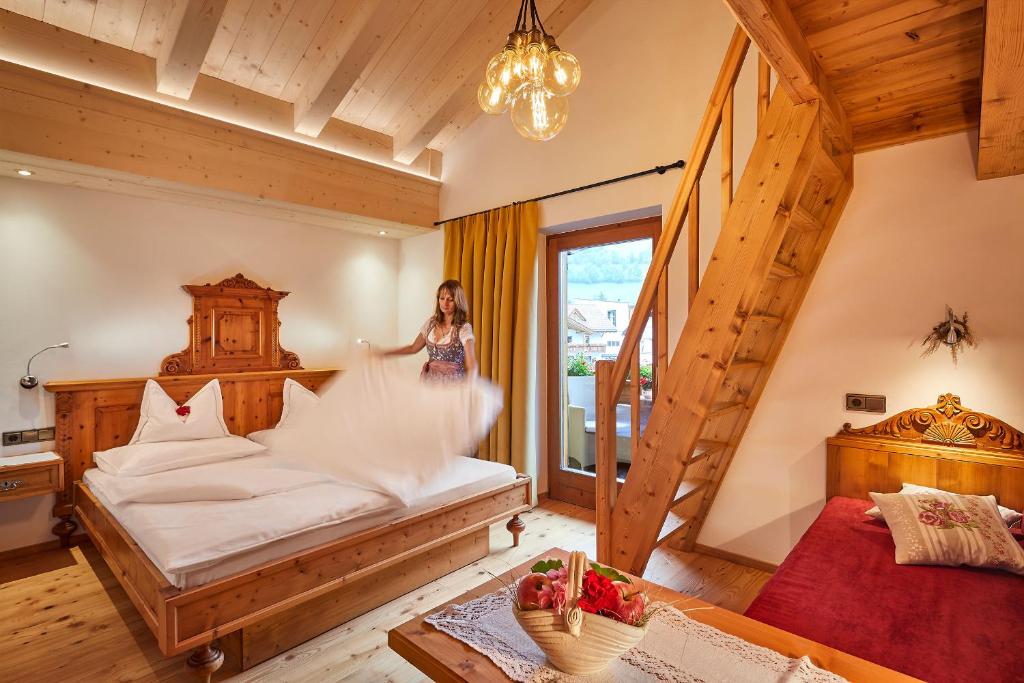 Postel nebo postele na pokoji v ubytování Hotel Al Sonnenhof