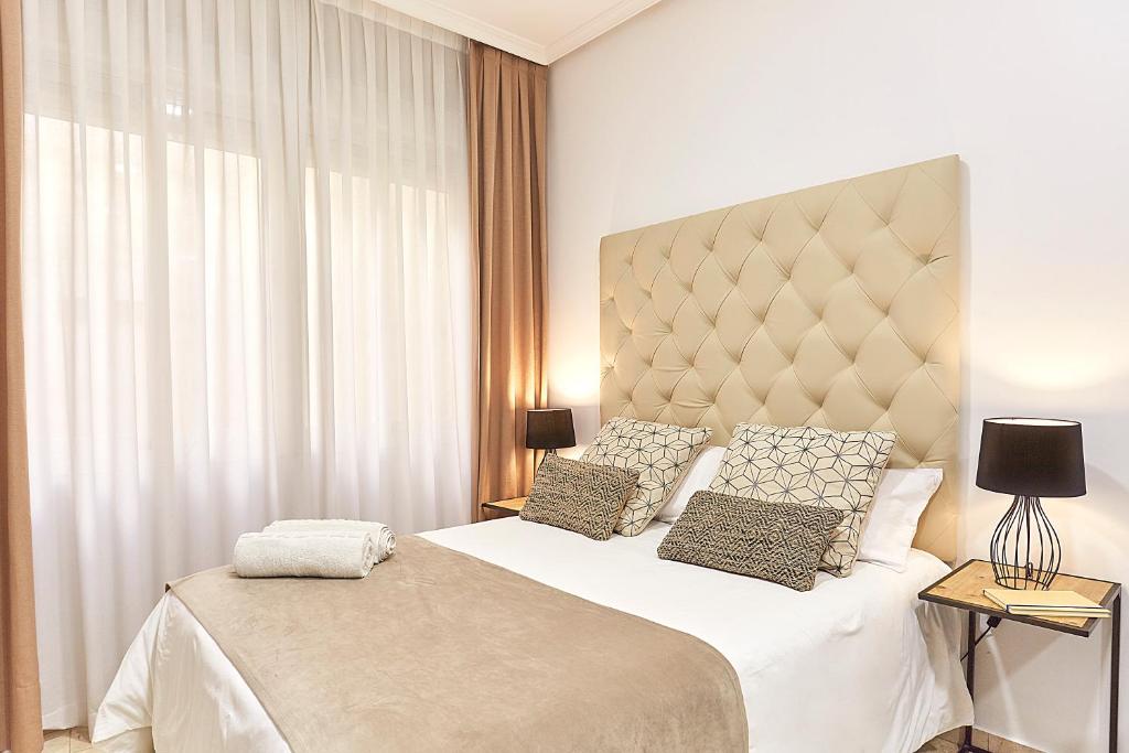 Postel nebo postele na pokoji v ubytování LEEWAYS LOFT XVI in GRAN VÍA