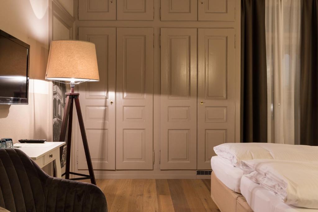 Letto o letti in una camera di Hotel Emmental