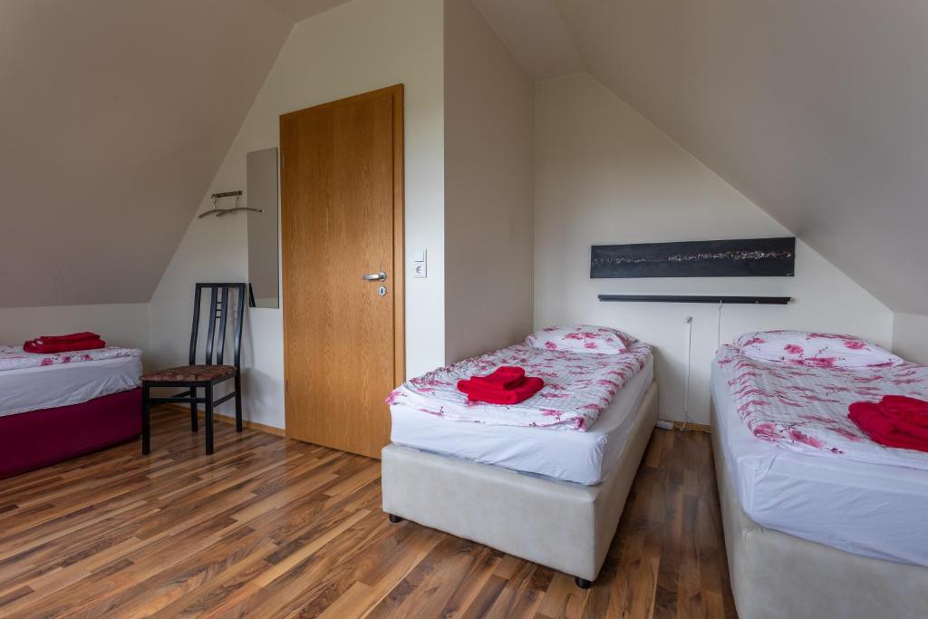 Postel nebo postele na pokoji v ubytování Guesthouse Dalbaer