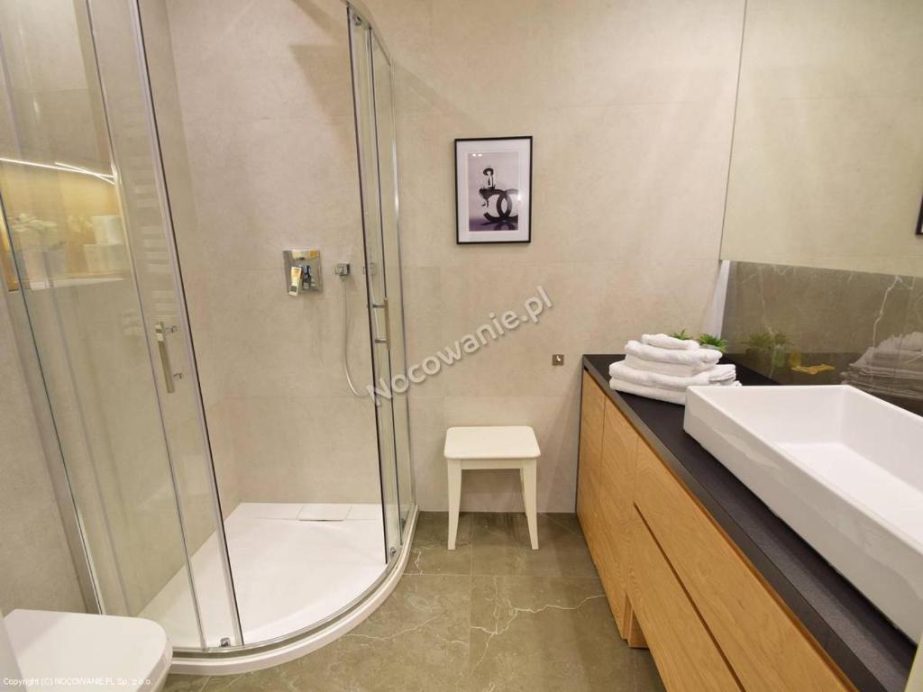 Kúpeľňa v ubytovaní APARTAMENT BLIŻEJ MORZA Sorrento z garażem
