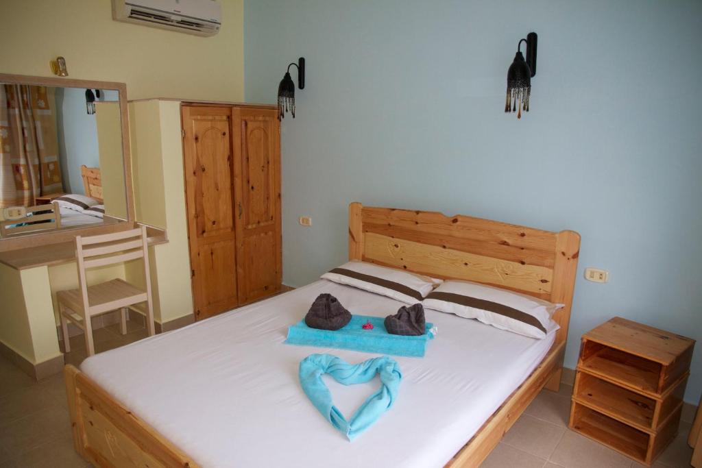 Postel nebo postele na pokoji v ubytování El Primo Hotel Dahab
