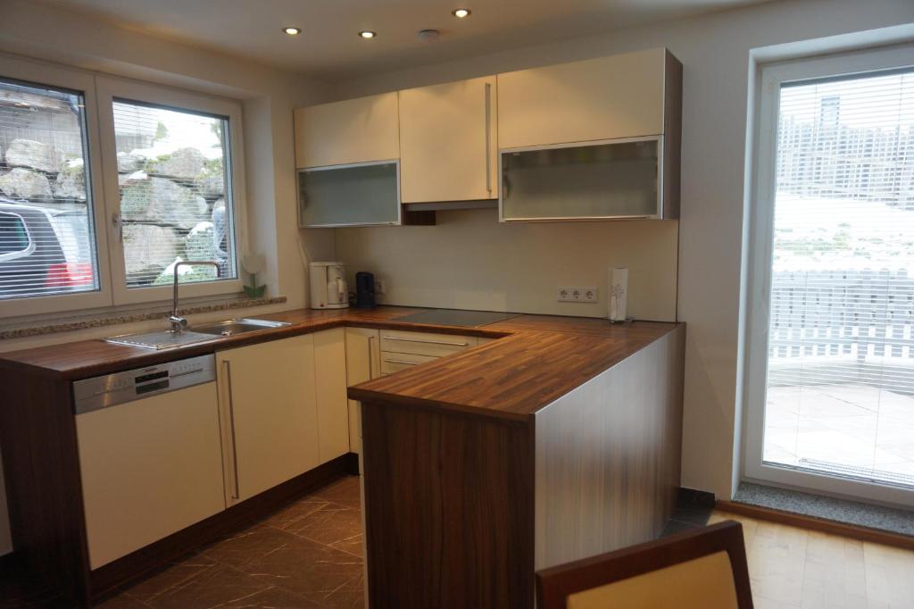 Kuchyň nebo kuchyňský kout v ubytování Appartement Deisl