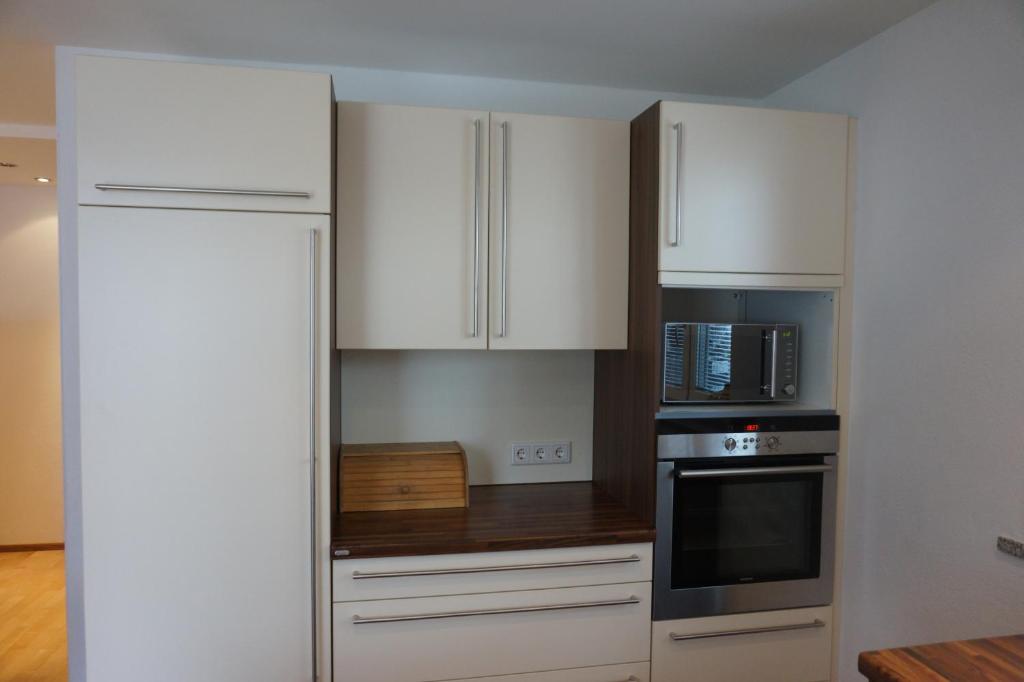 Kuchyň nebo kuchyňský kout v ubytování Appartement Deisl