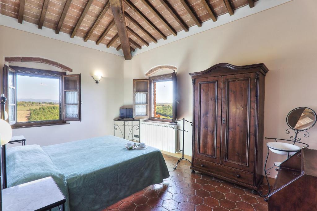 Posteľ alebo postele v izbe v ubytovaní Agriturismo Terra Rossa