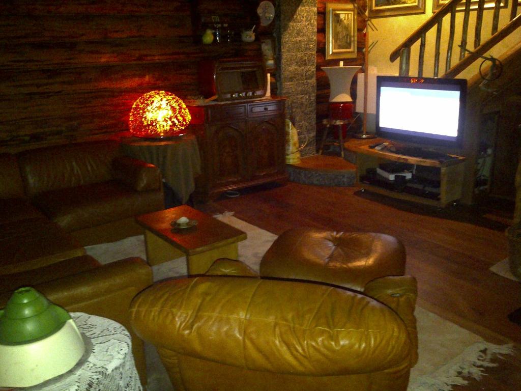 TV a/nebo společenská místnost v ubytování B&B Villa Plaz