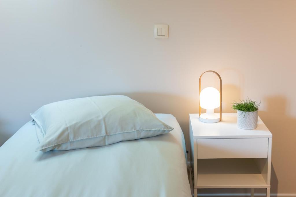 Postel nebo postele na pokoji v ubytování B&B Hof Beygaert