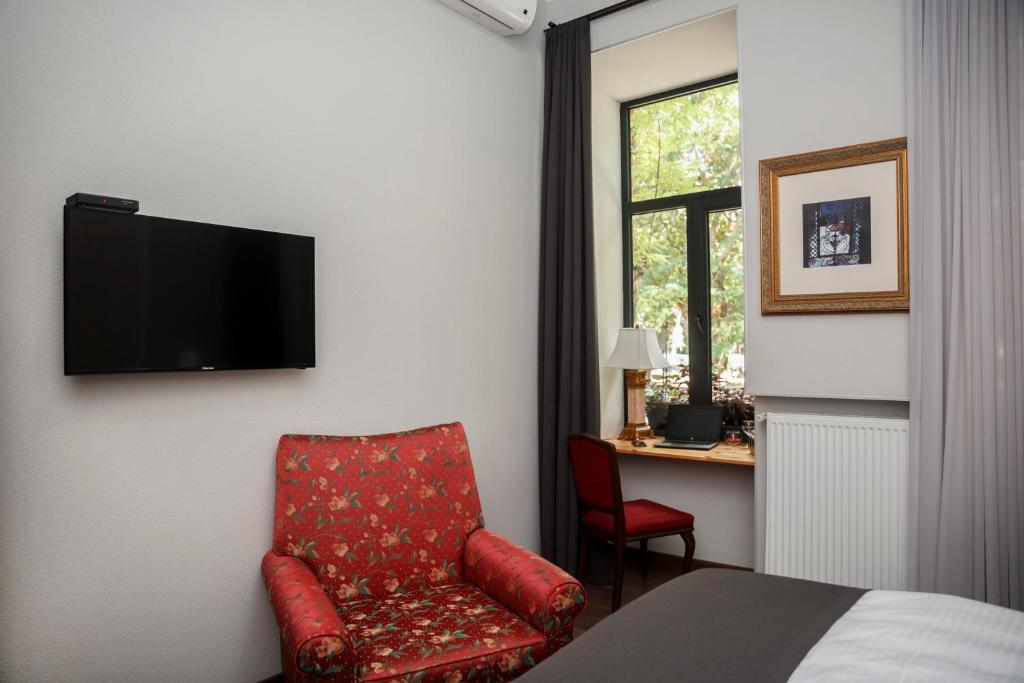 TV a/nebo společenská místnost v ubytování Tea for Two Hotel