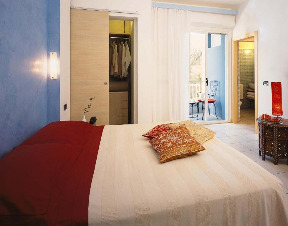 Postel nebo postele na pokoji v ubytování Hotel Gambrinus