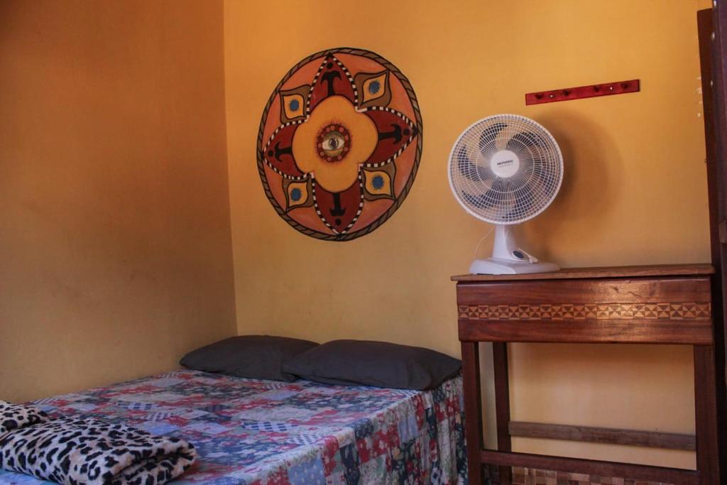 Giường trong phòng chung tại Do Alto da Montanha Pousada
