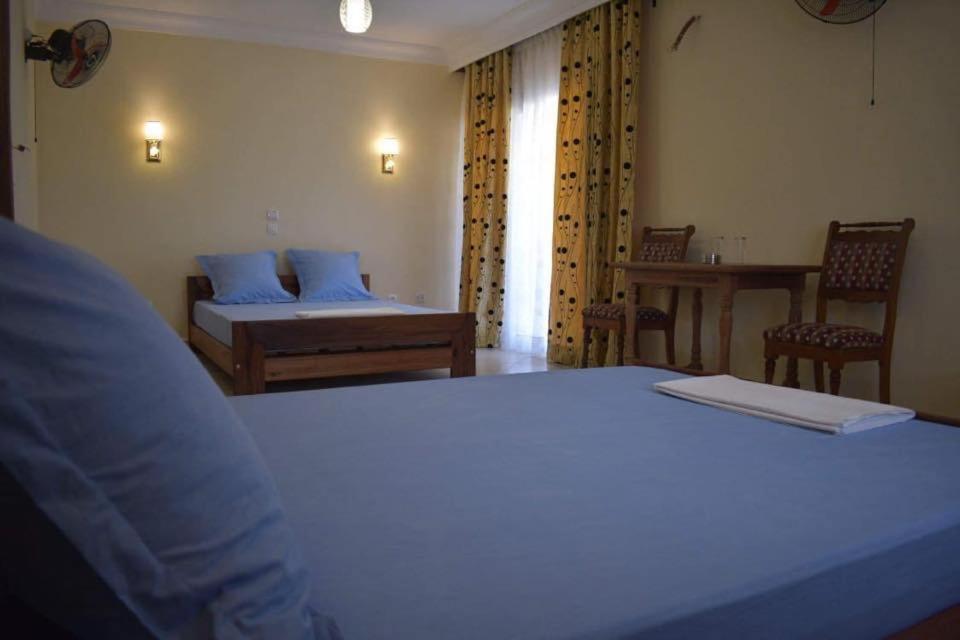 Postel nebo postele na pokoji v ubytování HOTEL MENABE
