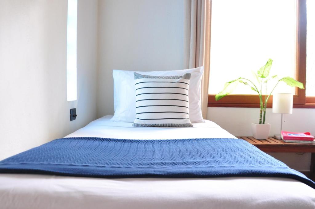 Postel nebo postele na pokoji v ubytování Pazifico Villas