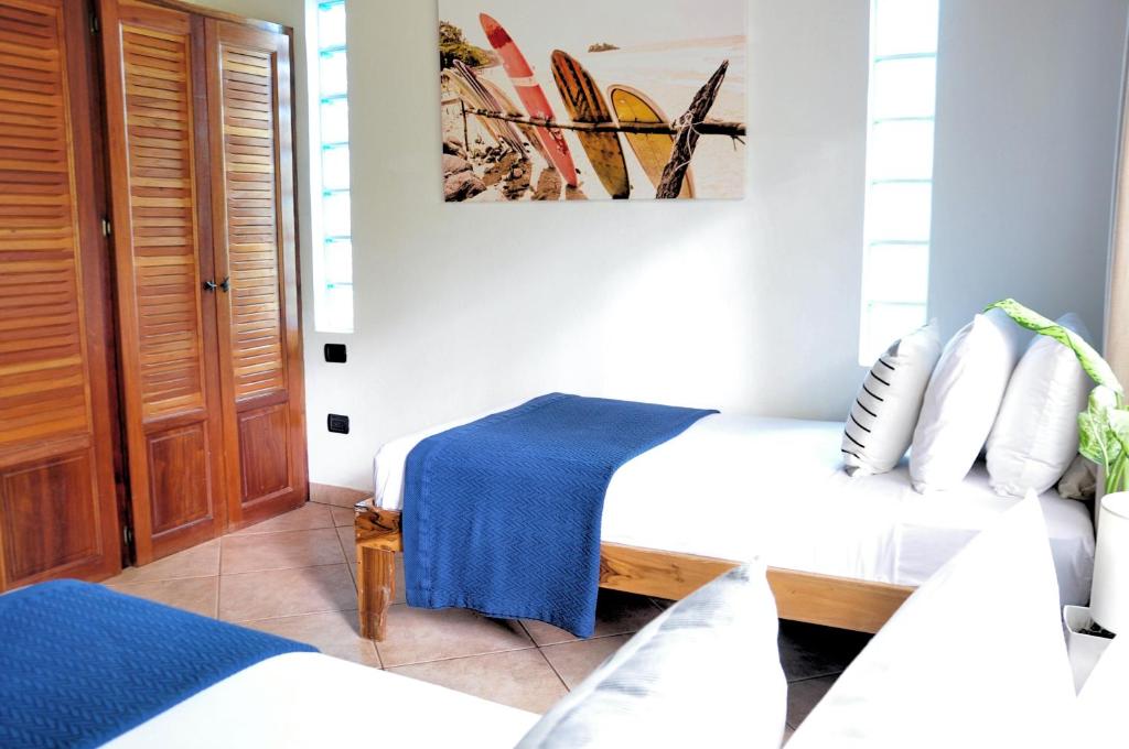 Postel nebo postele na pokoji v ubytování Pazifico Villas