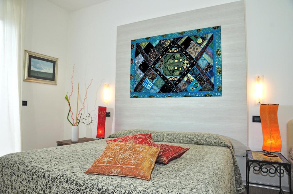 Postel nebo postele na pokoji v ubytování Hotel Gambrinus