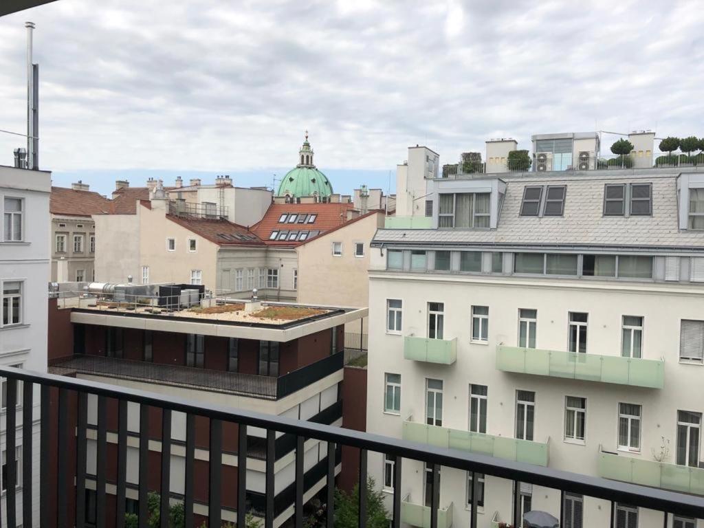 a view of a city from a balcony of buildings at Moderne trifft Tradition im Herzen Wiens in Vienna