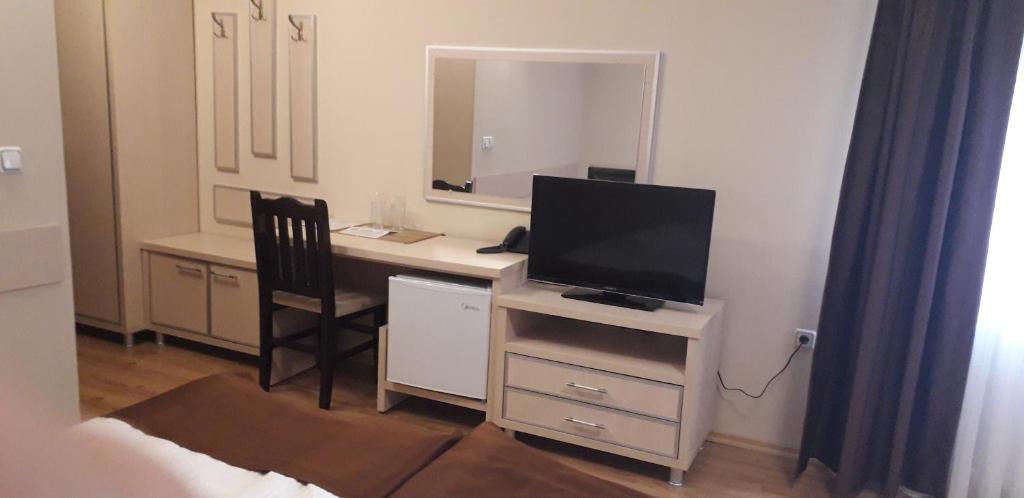 TV a/nebo společenská místnost v ubytování Heat Complex Family Hotel