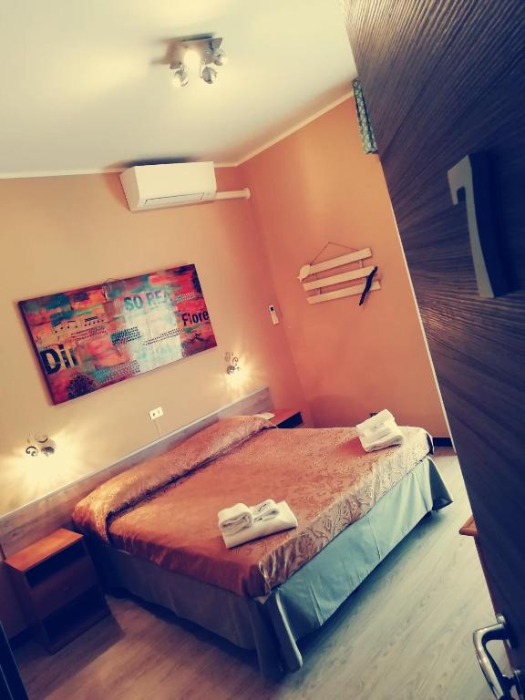 Postel nebo postele na pokoji v ubytování Hotel Eva La Romantica