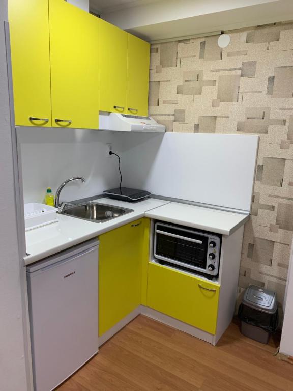 Kuchyň nebo kuchyňský kout v ubytování La Apartamento Centroom