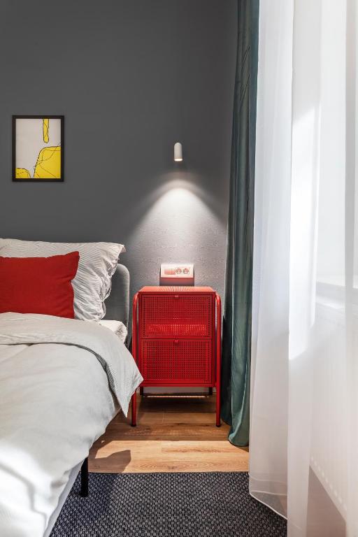 Postel nebo postele na pokoji v ubytování Martin Boutique Hotel
