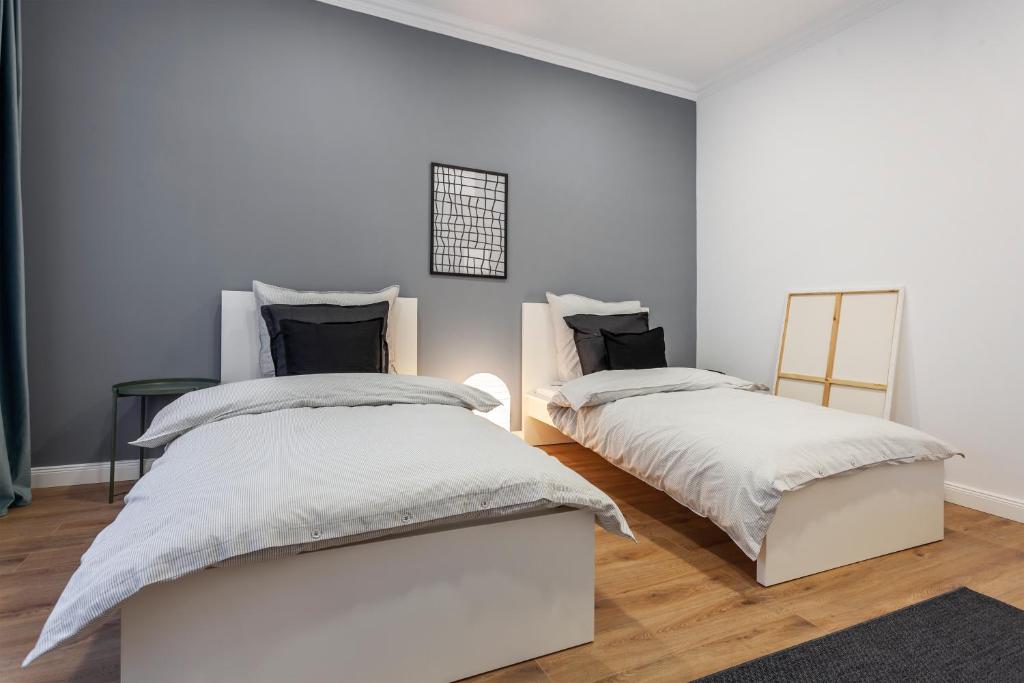 Postel nebo postele na pokoji v ubytování Martin Boutique Hotel