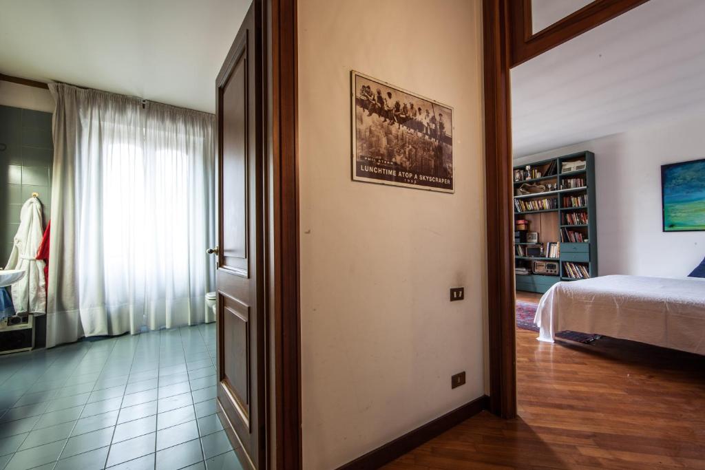Łóżko lub łóżka w pokoju w obiekcie La Gare B&B Fiera
