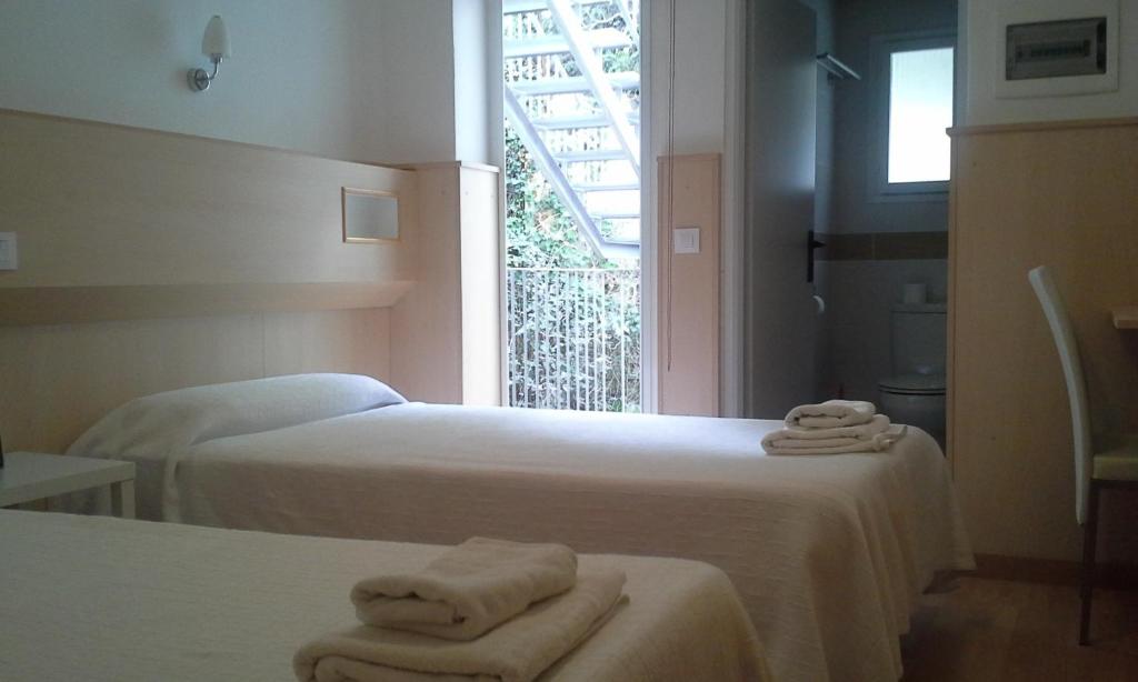Postel nebo postele na pokoji v ubytování Hostal Sant Bernat
