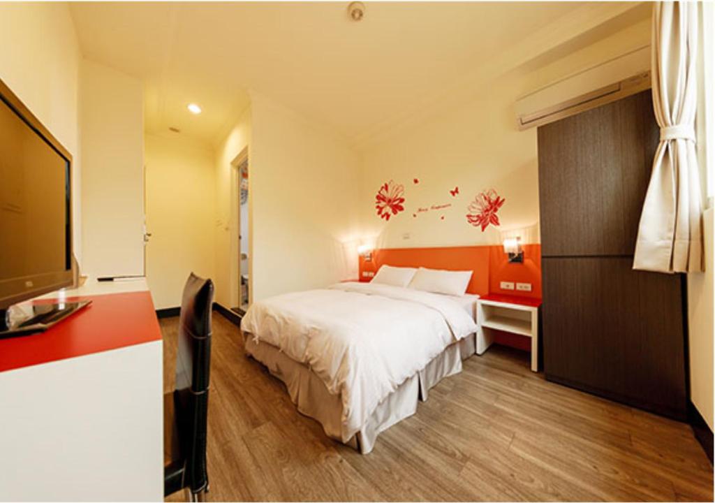 Postel nebo postele na pokoji v ubytování Backpacker B&B