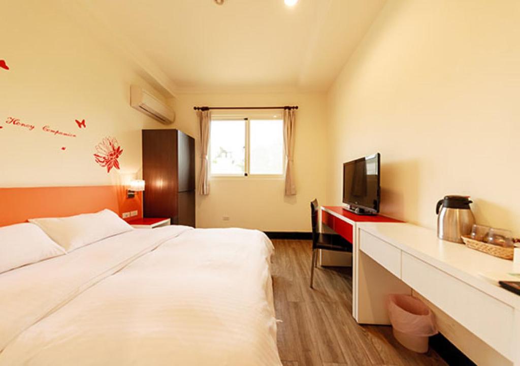 Postel nebo postele na pokoji v ubytování Backpacker B&B