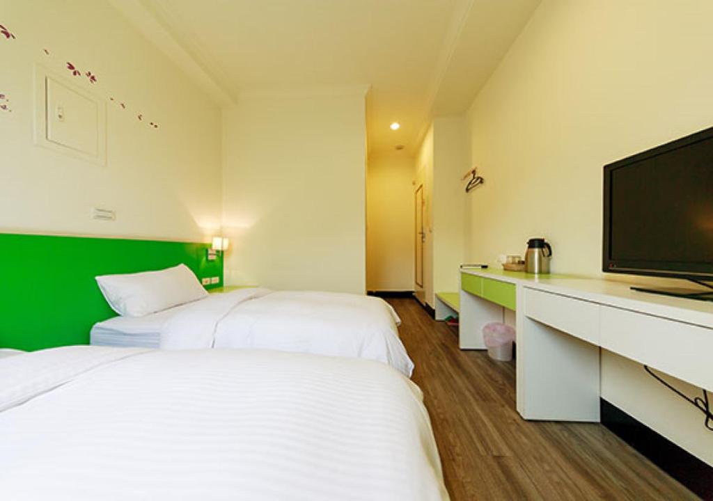 Postel nebo postele na pokoji v ubytování Backpacker B&B