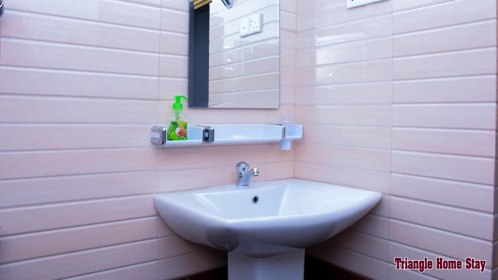 Koupelna v ubytování Triangle Home Stay