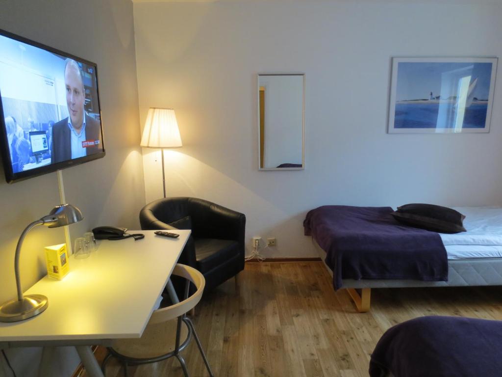 TV a/nebo společenská místnost v ubytování Hotel Göingehof