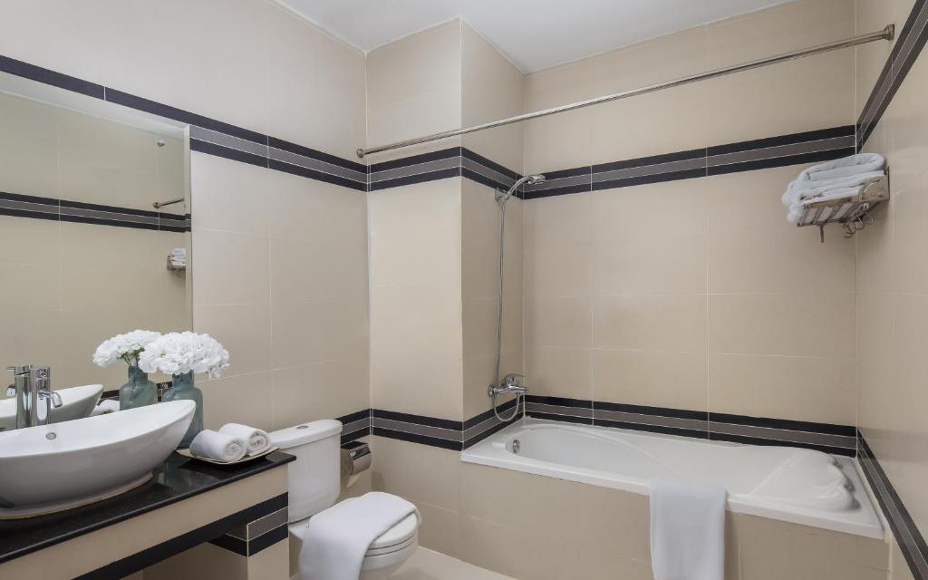 Koupelna v ubytování Altos Hotel