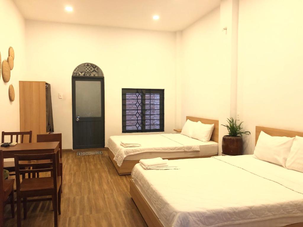 Giường trong phòng chung tại Vitamin Sea Homestay Nha Trang